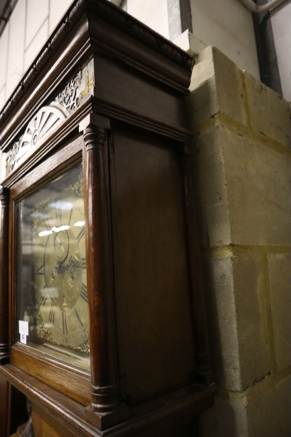 A George III oak eight day longcase clock, brass and silvered dial marked Mercer Hythe, height 218cm